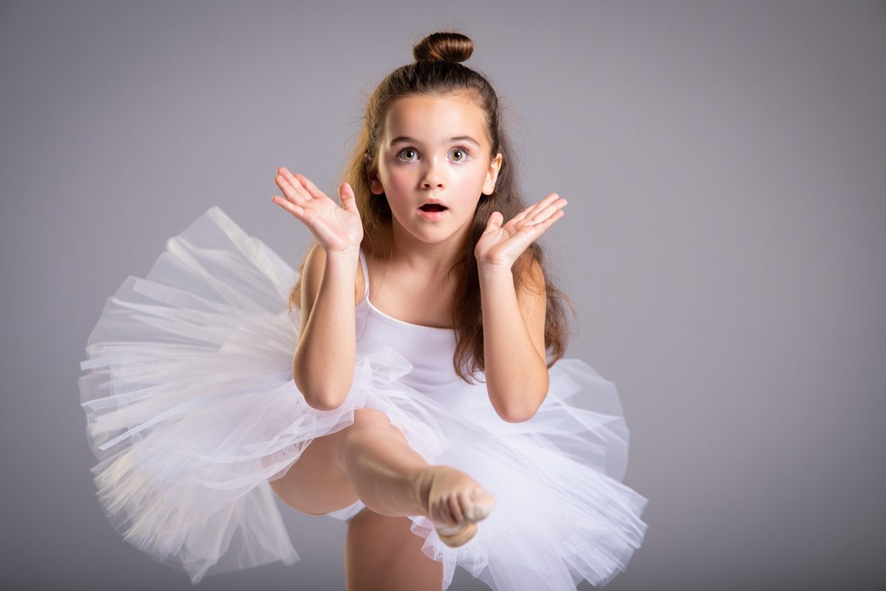 Graceful Young Dancer Captivates with Expressive Pose in Ethereal White Tutu Against Simple Background